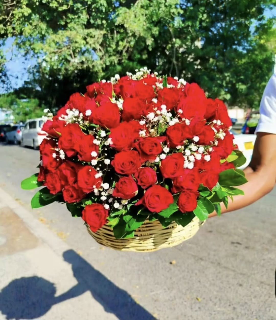 Red radiant love basket flowers